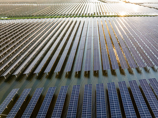 istock Solar panels at sunset，solar power plant 2214043282