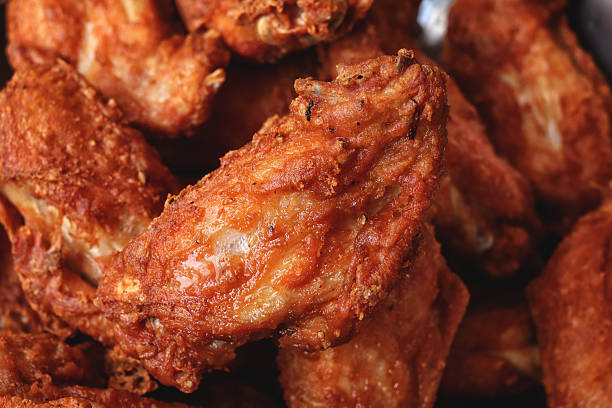 istock Fried chicken wings junk food 2214043306