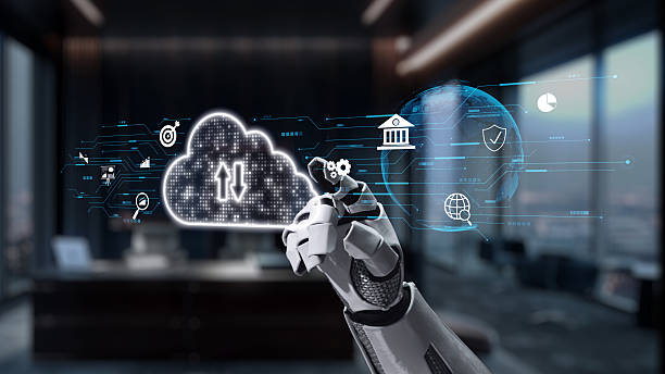 istock Futuristic Robot Hand Interacting with Cloud Technology and Digital Icons in Modern Office Environment. Auvana 2214045386