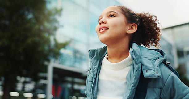 istock Outdoor, student and child at school thinking ready for class, lesson and learning with backpack. Inspiration, youth and girl on campus for future education, knowledge and development at academy 2214046719