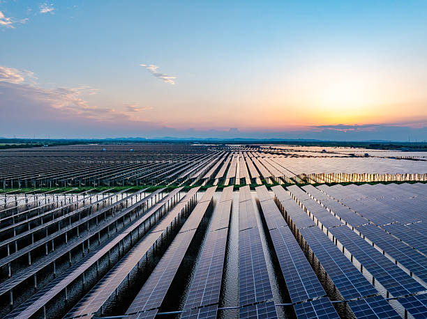 istock Solar panels at sunset，solar power plant 2214048574