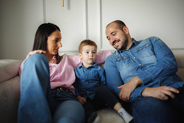 istock Relaxed Family Moment on Sofa 2214051219
