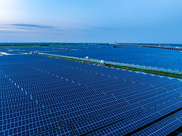 istock Solar panels at sunset，solar power plant 2214052177