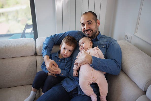istock Proud Dad With Son and Daughter 2214052560