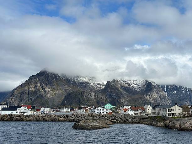 istock Coastal Village with Mountain Backdrop 2214054046