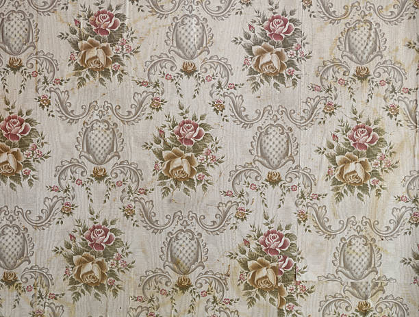 istock Old wallpaper on the wall. Old wallpaper for texture or background. 2214054250