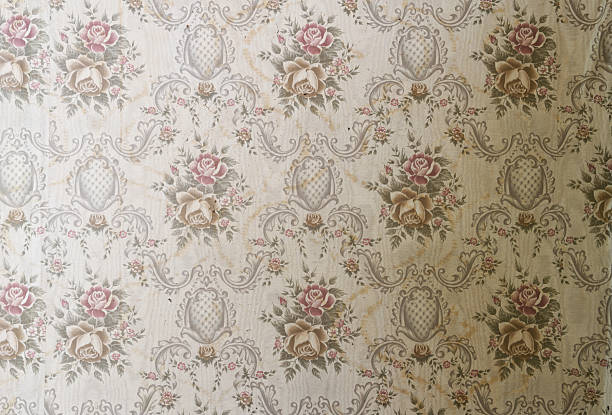 istock Old wallpaper on the wall. Old wallpaper for texture or background. 2214054263