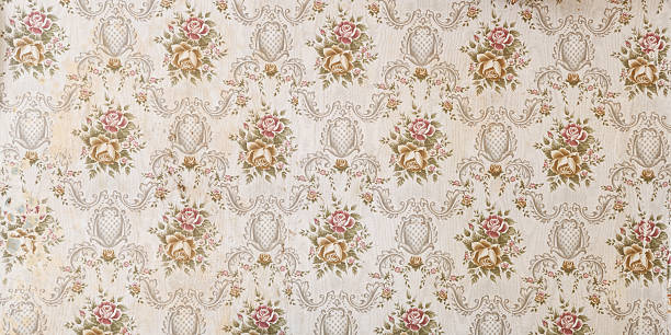 istock Old wallpaper on the wall. Old wallpaper for texture or background. 2214054270