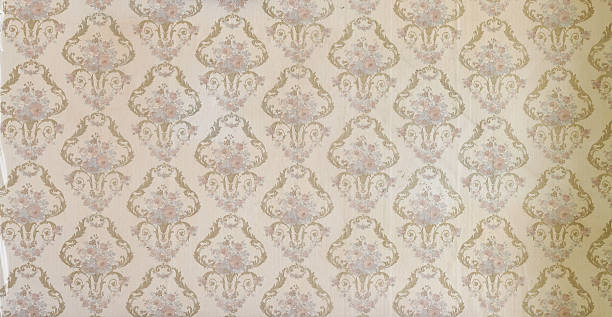 istock Old wallpaper on the wall. Old wallpaper for texture or background. 2214054305