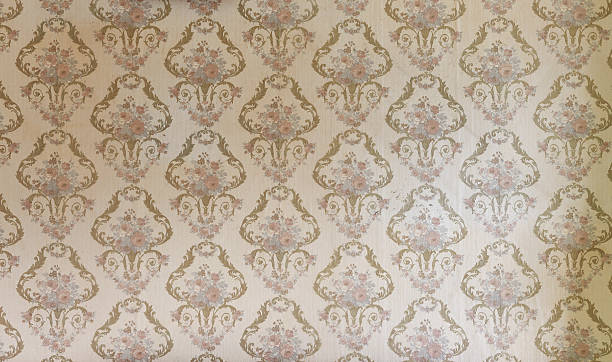 istock Old wallpaper on the wall. Old wallpaper for texture or background. 2214054376