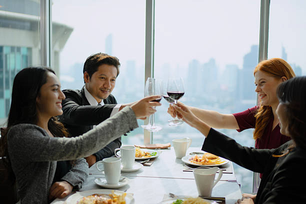 Group of diversity people are celebrating at luxury restaurant. Friendships, lifestyle, celebration.