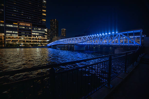 Illuminated bridge in city - wide