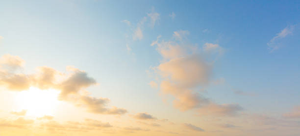 istock Golden sky and clouds,Beautiful , luxury soft gradient orange gold clouds and sunlight on the blue sky perfect for the background, take in everning,Twilight, Large size, high definition landscape phot 2214063957