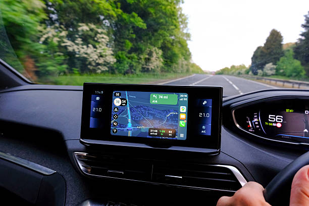 a road trip or commute with the view out of the windscreen from the drivers perspective with sat nav google maps - gps bildbanksfoton och bilder