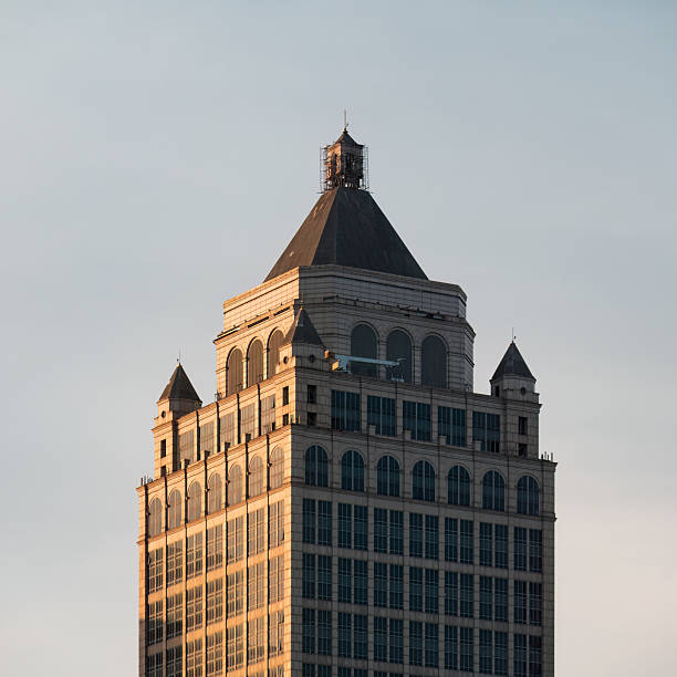 A commercial building with a steeple in a retro style