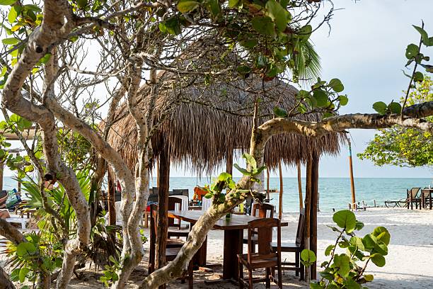 istock Tiki hut in tropical beach 2214071551