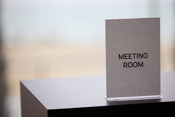 istock Minimalist acrylic tabletop sign in an elegant corporate setting. 2214071684