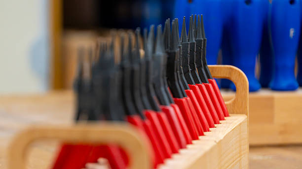 istock set of tools round pliers in a wooden box 2214071814