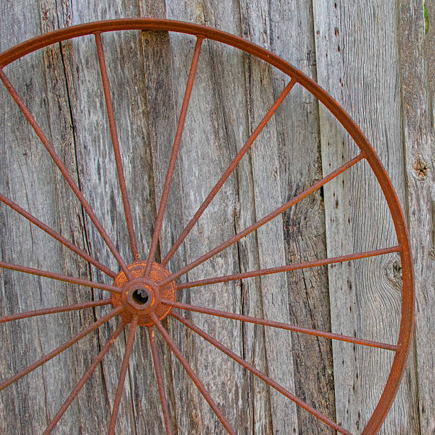 istock Old weathered wagon wheel-Howard County, Indiana 2214072444