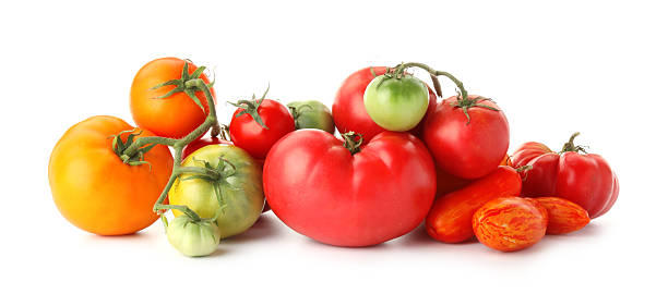 istock Different sorts of fresh ripe tomatoes isolated on white 2214072610
