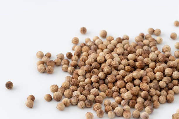 istock Close-up of whole coriander seeds 2214072613