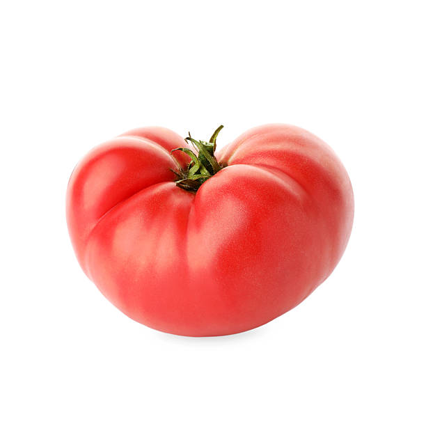 istock Fresh ripe pink tomato isolated on white 2214072631