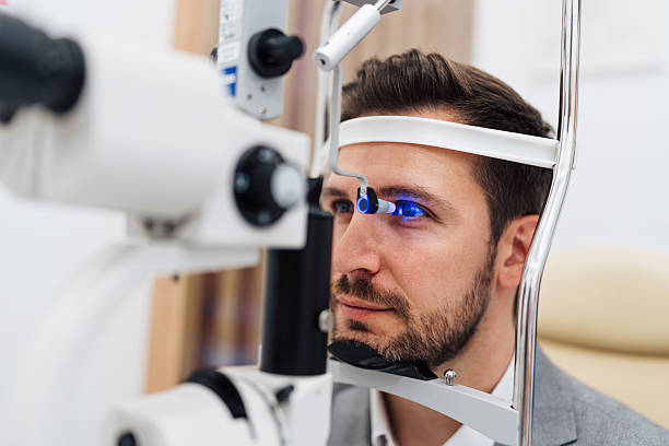 istock Man at eye vision medical check up 2214073014