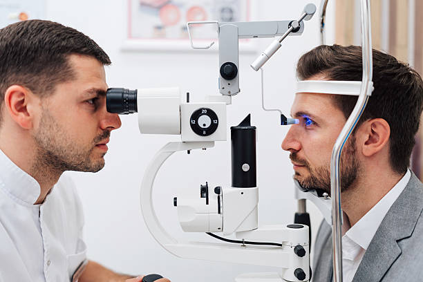 istock Man at eye vision medical check up 2214073022