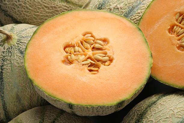 istock Many ripe Cantaloupe melons as background, closeup 2214073090