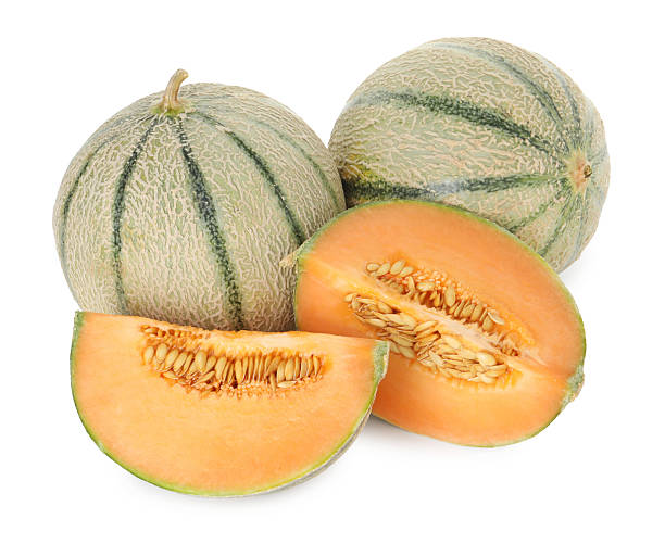 istock Tasty ripe Cantaloupe melons isolated on white 2214073130