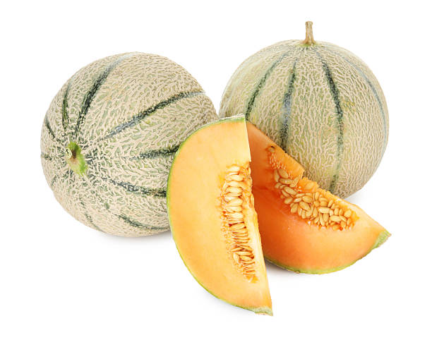 istock Tasty ripe Cantaloupe melons isolated on white 2214073140