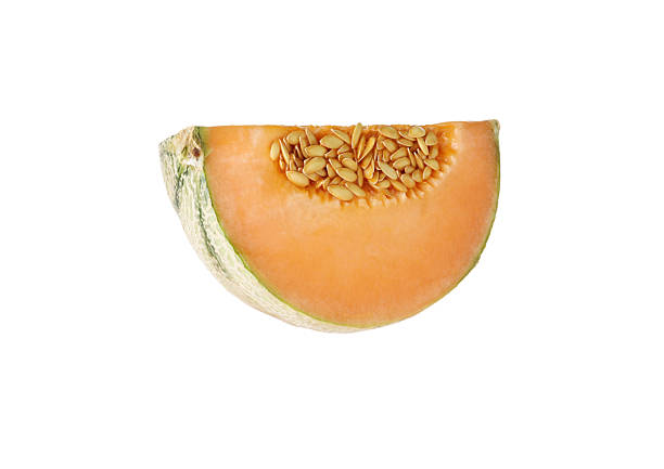 Piece of Cantaloupe melon isolated on white