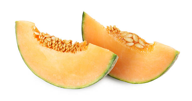 istock Slices of Cantaloupe melon isolated on white 2214073248