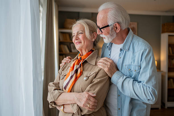 istock Senior couple sharing a tender moment at home 2214077091