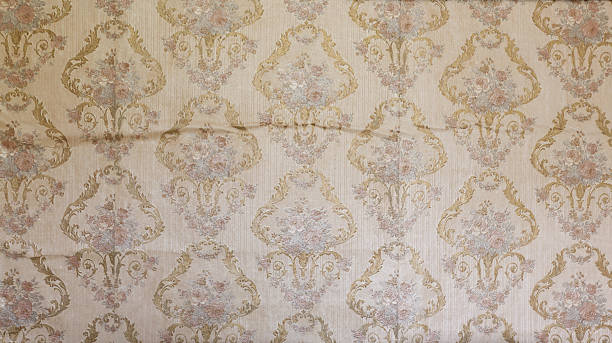 istock Old wallpaper on the wall. Old wallpaper for texture or background. 2214077721