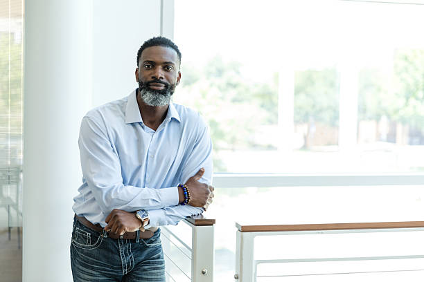 istock Confident African American man in a light blue shirt 2214081929