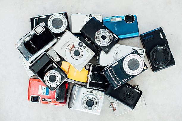 Pile of old digital compact cameras