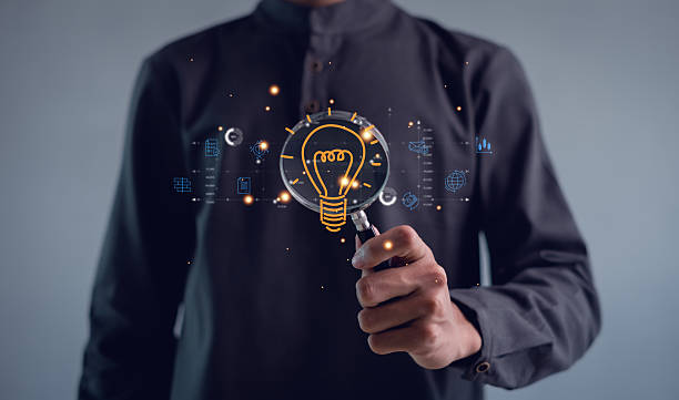 istock Human hand holding light bulb to illuminate. Innovation through ideas and inspiration ideas. idea of creativity and inspiration concept of sustainable business development. 2214083408