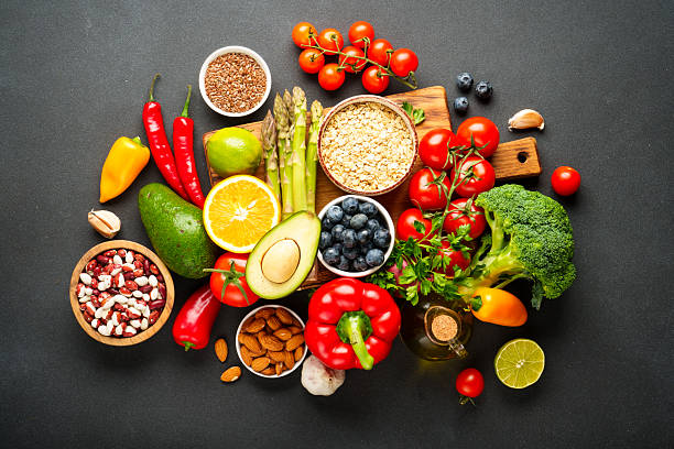 istock Healthy food assortment on black background. 2214086313