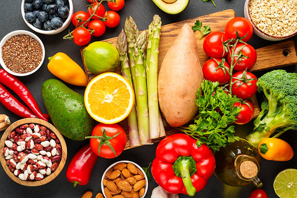 istock Fresh vegetables, fruits, grains, leaves and nuts. 2214086314
