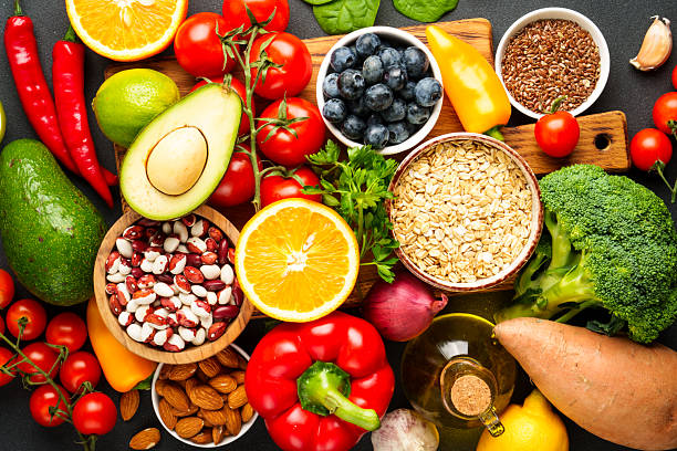 istock Healthy food assortment on black background. 2214086409