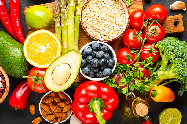 istock Healthy food assortment on black background. 2214086410