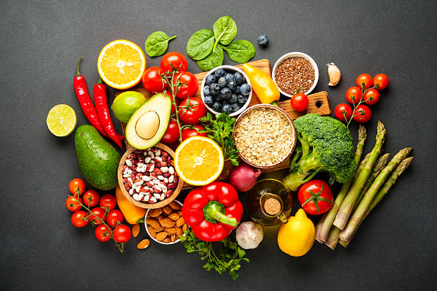istock Healthy food assortment on black background. 2214086474