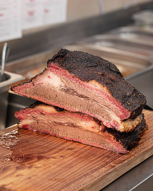 istock Freshly grilled brisket meat but in half 2214089477