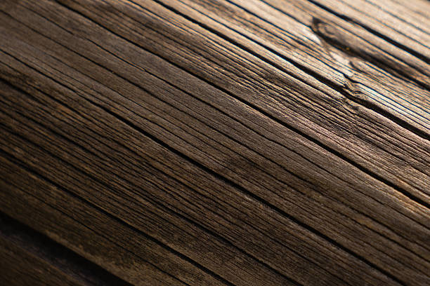 Old wooden barn wall in summer hot day