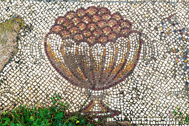 Part of mosaic flooring, ancient Greek style. Tiled flooring, old and weathered. Image suitable for backgrounds. Galicia, Spain.