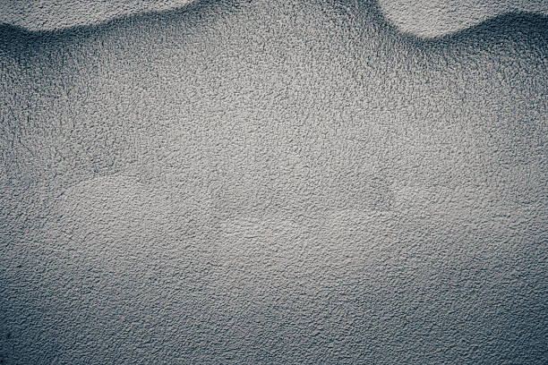 Texture of a wall painted in a strong color, details of materials and colors.