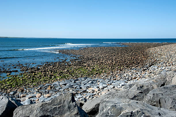 Rugged landscape of the Burren region of County Clare, Ireland. Exposed karst limestone bedrock at the Burren National Park