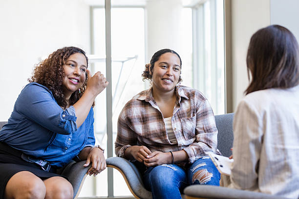 istock Group Therapy Session: Diverse Women Discussing Mental Health 2214106944
