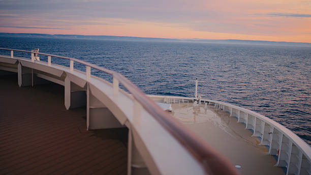 istock Scenic Ocean View From Cruise Ship Deck at Sunset 2214111036